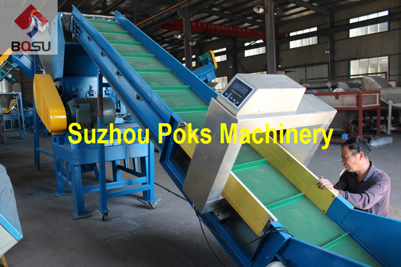 Belt conveyor with metal detector